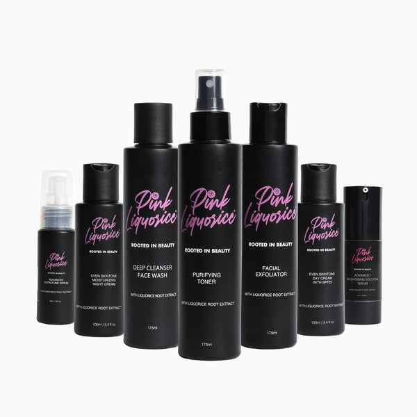 Seven black bottles of skincare products by Pink Liquorice