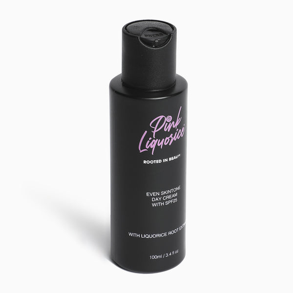 Side view of black bottle of Day Cream