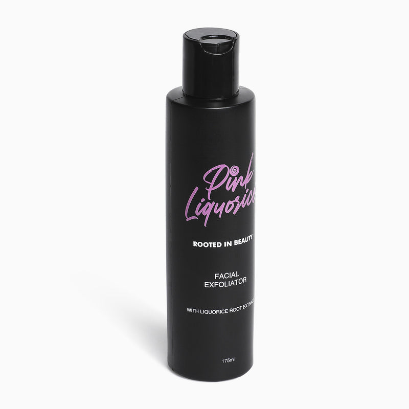 Side view of a black bottle of a facial exfoliator
