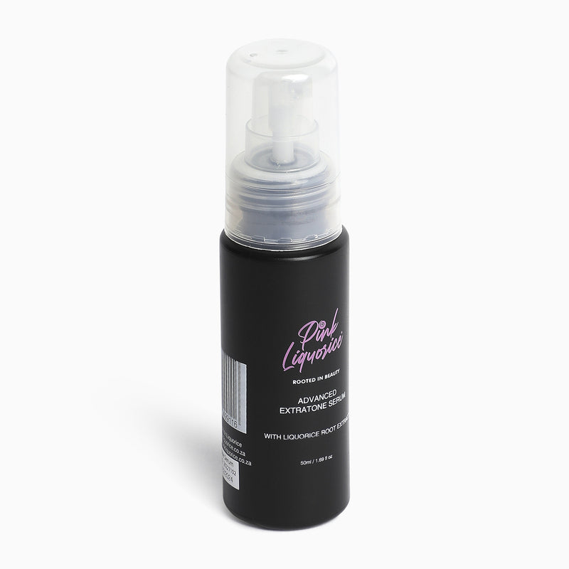 Side view of black skincare bottle of face serum